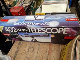 A Tasco 402 power telescope.