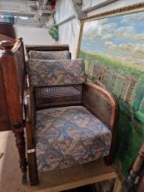 A pair of early 20th century bergere armchairs.