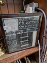 An early 20th century advertising display case with drawer to back.