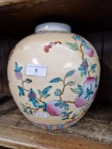 A large Chinese vase decorated with peaches and bats