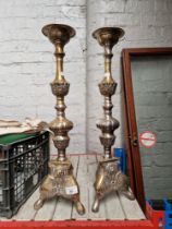 A pair of large floor standing ecclesiastical candlesticks, height 58cm, approximately 2.6kg each.