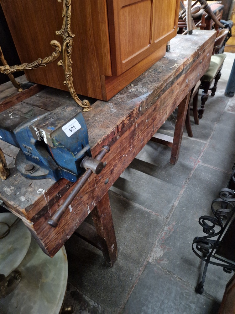 A pine work bench with Record No.2 vice attached.