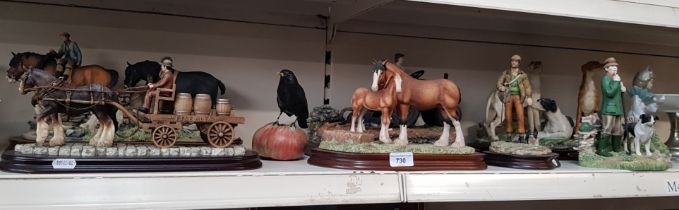 A group of figurines mainly modelled as working horses, dogs, shepherds, and farm vehicles, mostly