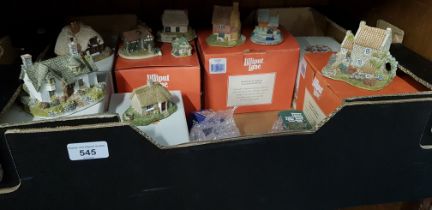 A box of Lilliput lane cottages, mostly boxed.