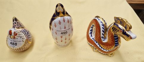 Three Royal Crown Derby Imari paperweights; dragon and penguin, both with gold stoppers, and Chicken