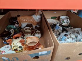 Two boxes of mixed pottery and ornaments including porcelain figures, Goss crested ware, etc.