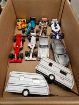 A box of eight Scalextric cars and two caravans (as found).