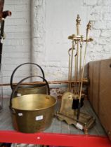 Two large brass jam pans together with two copper and brass coaching horns and brass fire tidy.
