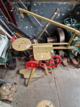 A vintage treadle operated scroll saw.