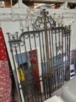 A pair of large wrought iron gates.