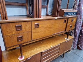 A mid 20th century teak sideboard by BCM (Bath Cabinet Makers).