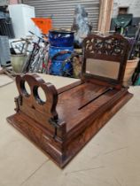 A Victorian walnut stereo viewer.