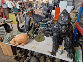 A selection of metal and pottery garden ornaments to include a Silverback Gorilla, Peacock, Heron,