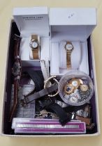 A box of watches and watch straps.