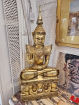 An Eastern gilt seated Buddha figure with elephants to base, height 94cm (approx)