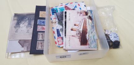 A mixed lot comprising old postcards, photos, stamps, watch movements and coins including a crown.