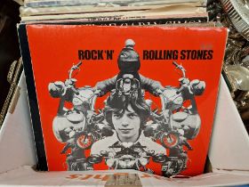 A box of pop and rock LPs including Rolling Stones, Elton John, etc.