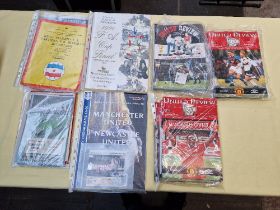 A box of football programmes including two 1960s European cup finals, three FA cup finals (two