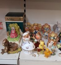 A Royal Doulton Bunnykins ‘Summer Dreams’ figurine together with other items including Beatrix