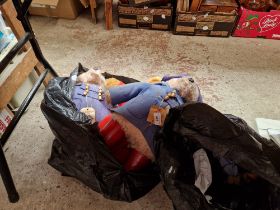 3 Paddington bears and a collection of other soft toys.