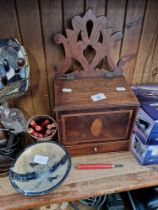 An antique salt box together with a soapstone bowl and collection of wood chisels in a tin box.