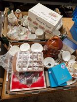 Two boxes of misc. ceramics and glass to include mugs, vases, thimble display unit with various