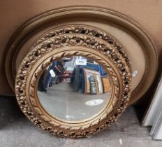 Two gilt framed convex mirrors & a gilt framed photo of a child.