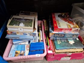 Two boxes of mixed books, Olympic memorabilia, DVDs & jigsaws etc.