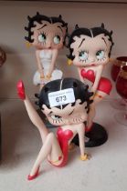 Three Betty Boop figures