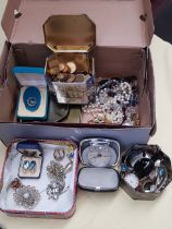 A mixed lot of costume jewellery including vintage brooches, silver, watches, etc.