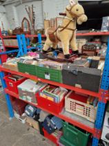 9 boxes of books & a childs musical rocking horse.