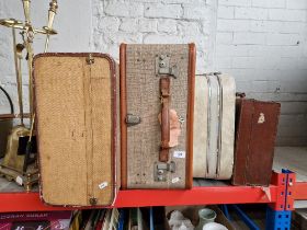 4 vintage travel cases.