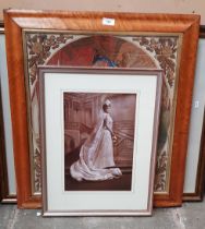 A 19th century needlework picture depicting Queen Victoria, together with a photographic print and a