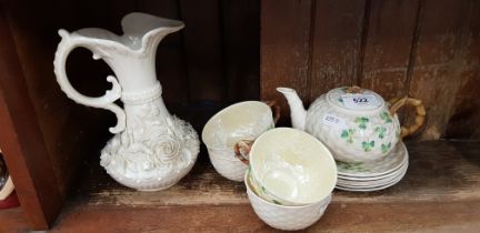 A Belleek porcelain basketware tea set decorated with shamrocks, 11 pieces.