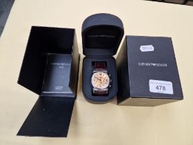 A boxed Emporio Armani wristwatch.