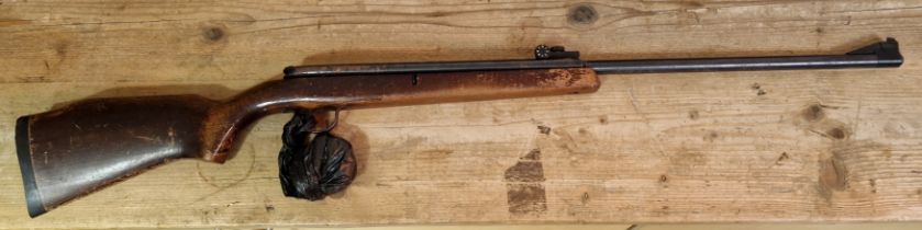 A Webley Osprey lever action .22 calibre air rifle , 109cm long, with a tin of pellets. (BUYER