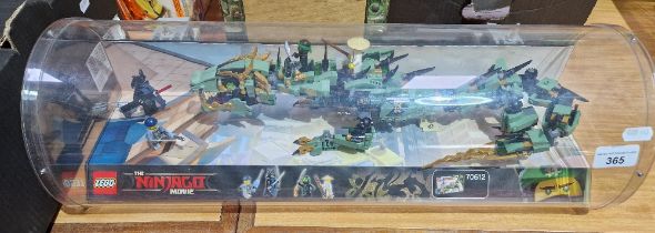 A Lego set 'The Ninjago Movie' #70612 in shop display case.