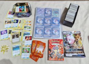 A collection of Pokemon cards to include hols & shinys etc. As seen, no returns.