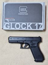 A Glock 17 4.5mm calibre Co2 air pistol, serial no.ACWA517, 19cm long, in original box with....