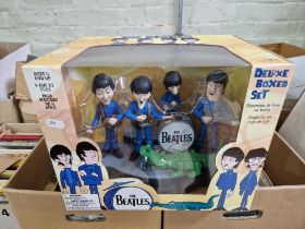 The Beatles deluxe boxed set cartoon figures in original window box.