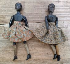 Two vintage wooden carved female dolls believed to be off a mechanical automaton.