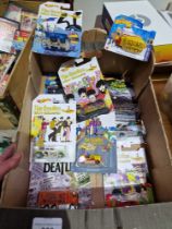 A box of assorted beatles & Batman themed hot wheels toys, all in original boxes.