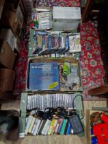 An Xbox 360 & a Playstion in boxes together with 4 boxes of assorted Xbox, Xbox 360, PC & playstaion