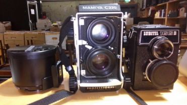 A Mamiya C220Professional medium format camera, together with a Lubitel 166B and a Tamron SP 1:5.6