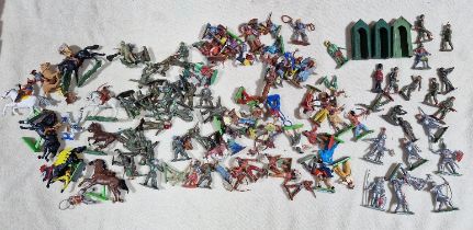 A box of toy soldiers, cowboys & Indians and knights including some lead figures marked England.