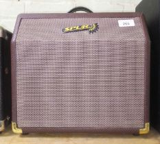 A Spur 15c acoustic guitar amp.