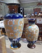 Two Doulton Lambeth stoneware vases, heights 30cm and 44cm.