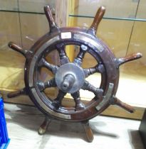 A ship's/boat's brass mounted wheel, diameter 61cm.
