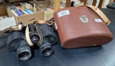 A pair of Carl Zeiss Jena Deltrintem 8x30 binoculars with leather case.