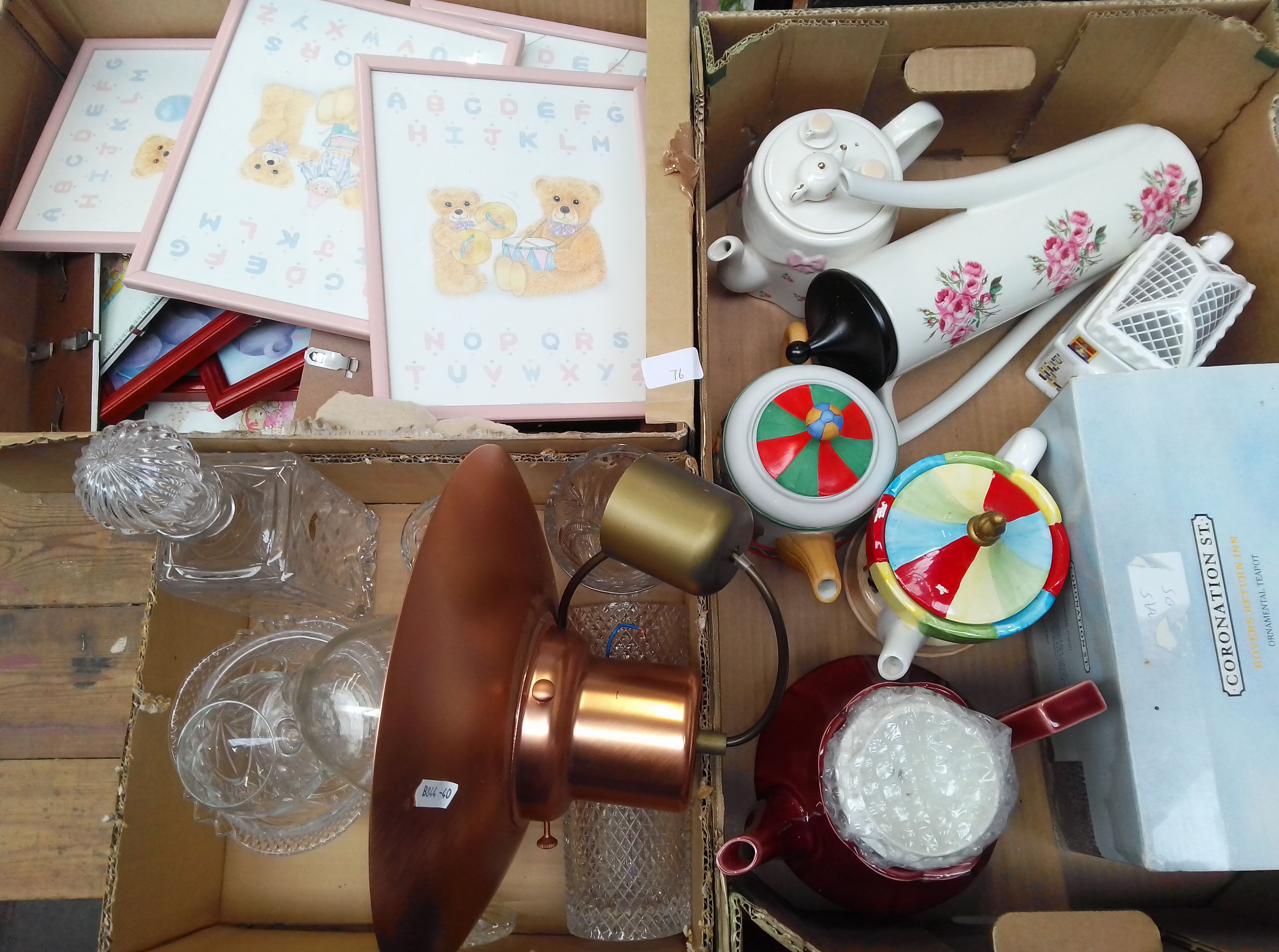 A box of glassware and a copper lamp, a box of collectors teapots, and a box of alphabet pictures